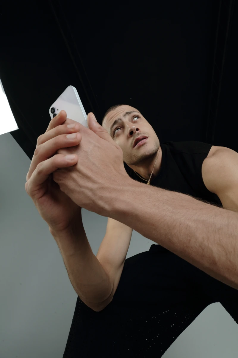 Low-angle portrait of Fares Abdeddayem with the Galaxy A15