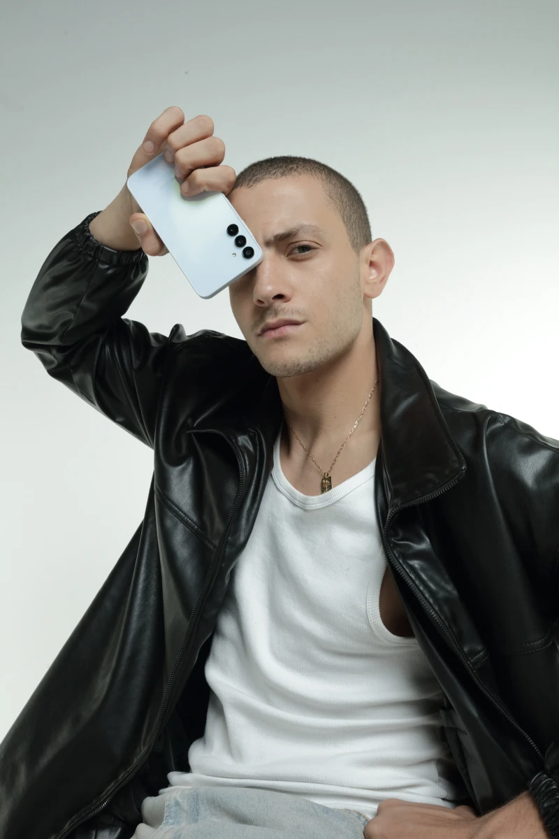 Fares Abdeddayem posing with the Galaxy A15 camera